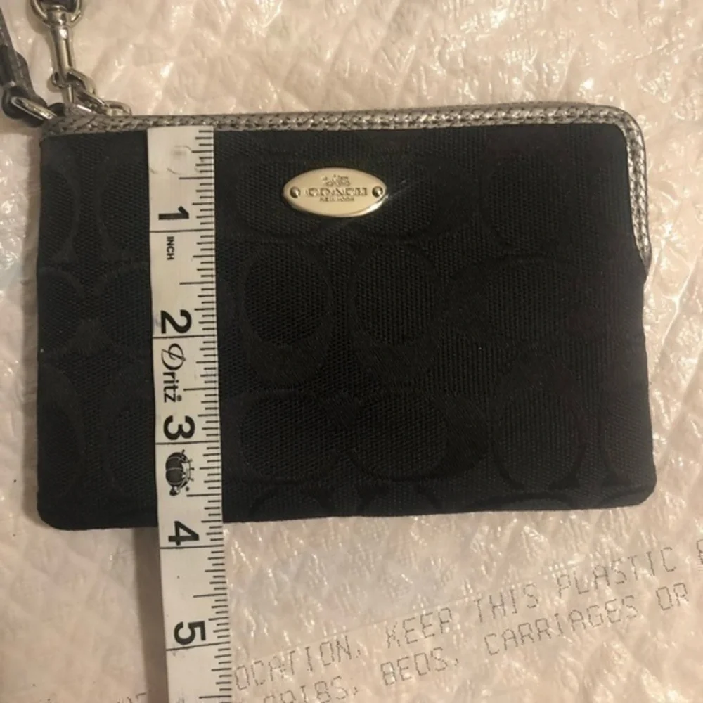 Coach black signature wristlet
